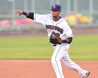 NILES, OHIO - JULY 6, 2015: Short stop Willi Castro #2 of the Scrappers throws the baseball to first for the out in the 2nd inning of Monday nights game at Eastwood Field. DAVID DERMER | THE VINDICATOR