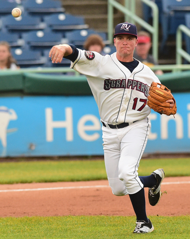 NILES, OHIO - JULY 6, 2015: Third basemen Nate Winfrey #17 of the Scrappers throws the ball to first for the out in the 2nd inning of Monday nights game at Eastwood Field. DAVID DERMER | THE VINDICATOR