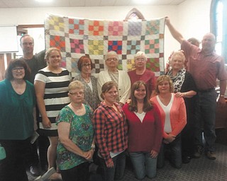 SPECIAL TO THE VINDICATOR
Calla Community Church, 6482 W. Calla Road, Canfield, will host its annual Lawn Festival at 4:30 p.m. Saturday, rain or shine. Sandwiches, side dishes, beverages, pies and cakes will be sold. A Country Store will feature homemade baked goods, woven rag rugs and other items. A quilt, which was made by several women of the church, will be raffled. Tickets are $1 each or six for $5. Proceeds from the raffle will be used to help with local mission work. Members of the church helping with the festival are, in front from left, Kim Coleman, Olivia Wince, Emmalee Wince and Christine Wince; in the second row, Paula Yeoman, Lydia Schlegel, Diana Houston, Ardith Strabala, Shirley Baker and Janet Schlegel; and in back, holding the quilt, Wayne Anderson and Edward Schlegel.