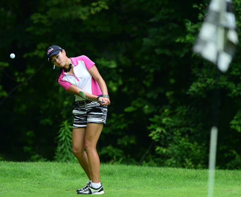 CANFIELD, OHIO - JULY 7, 2015: Jacinto Pikunas of Boardman chips onto the green on the 15th hole Tuesday afternoon at Diamondback during a Vindy Greatest Golfer qualifying Tournament. DAVID DERMER | THE VINDICATOR
