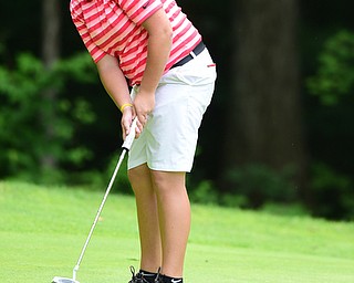 CANFIELD, OHIO - JULY 7, 2015: Kaylee Neumeister of Cortland follows through on her putt on the 15th hole Tuesday afternoon at Diamondback during a Vindy Greatest Golfer qualifying Tournament. DAVID DERMER | THE VINDICATOR
