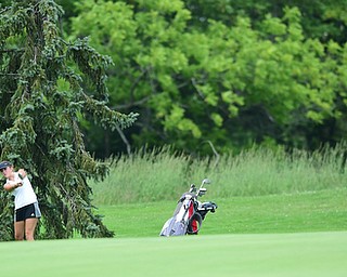 CANFIELD, OHIO - JULY 7, 2015: Kristin Shelley of Canfield chips onto the green from the short rough not he 10th hole Tuesday afternoon at Diamondback during a Vindy Greatest Golfer qualifying Tournament. DAVID DERMER | THE VINDICATOR