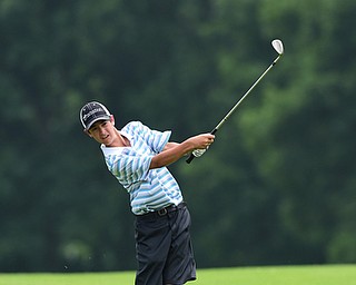 CANFIELD, OHIO - JULY 7, 2015: Dante Flak of Canfield chips onto the green from the fairway on the 13th hole Tuesday afternoon at Diamondback during a Vindy Greatest Golfer qualifying Tournament. DAVID DERMER | THE VINDICATOR