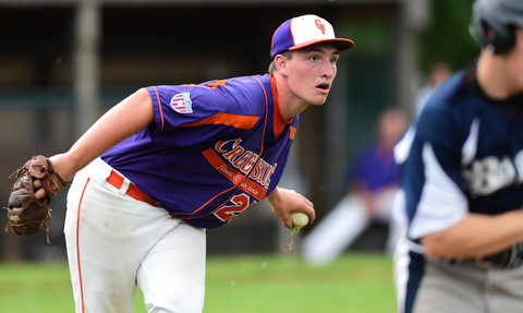 STRUTHERS, OHIO - JULY 8, 2015: Pitcher Eric Sapp #25 of Creekside looks to first after fielding a bunt to get out the runner in the 3rd inning during Wednesday nights Little B championship game at Cene Park.