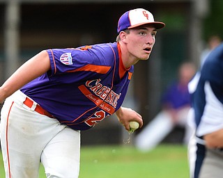 STRUTHERS, OHIO - JULY 8, 2015: Pitcher Eric Sapp #25 of Creekside looks to first after fielding a bunt to get out the runner in the 3rd inning during Wednesday nights Little B championship game at Cene Park.