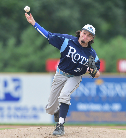 STRUTHERS, OHIO - JULY 10, 2015: Pitcher Luke Kelly #23of Roth throws a pitch in the 2nd inning during Friday nights Class B baseball game at Cene Park. DAVID DERMER | THE VINDICATOR
