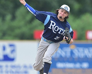 STRUTHERS, OHIO - JULY 10, 2015: Pitcher Luke Kelly #23of Roth throws a pitch in the 2nd inning during Friday nights Class B baseball game at Cene Park. DAVID DERMER | THE VINDICATOR