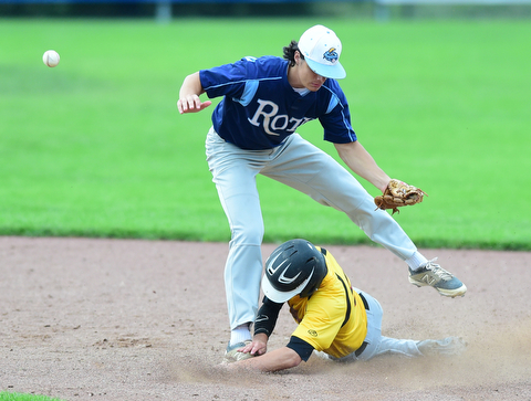 STRUTHERS, OHIO - JULY 10, 2015: Base runner Zach Senchak #5 of DuraEdge steals second base after second basemen Jack Lynch #11 of Roth had the ball knocked out of his glove on the slide in the 7th inning during Friday nights Class B baseball game at Cene Park. DAVID DERMER | THE VINDICATOR