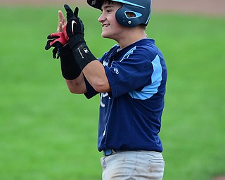 STRUTHERS, OHIO - JULY 10, 2015: Josh Fristik #8 of Roth celebrates on 1st base after a 2 RBI single to tie the game in the 7th inning during Friday nights Class B baseball game at Cene Park. DAVID DERMER | THE VINDICATOR