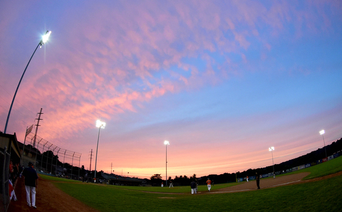 STRUTHERS, OHIO - JULY 10, 2015: The sun sets over Cene Park during a game between the Astro Falcons Rudzik Excavating Friday night. DAVID DERMER | THE VINDICATOR