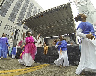 William DLewis The Vindicator  Members of the Kigndon Dancers perform during 2015Gospel Festival in downtown Youngstown Sunday 7-12-15. They are a dance monistry with members for several area churches.