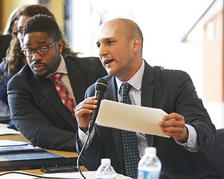        ROBERT K. YOSAY  | THE VINDICATOR..State Sen. Joe Schiavoni  state Rep. Michele-Lepore-Hagan, Mayor John A. McNally will hosted a meeting  William Holmes McGuffey Elementary School to discuss the Youngstown plan legislated for city schools recovery.  .behind him is  Moderatro Pastor Chris McKee .