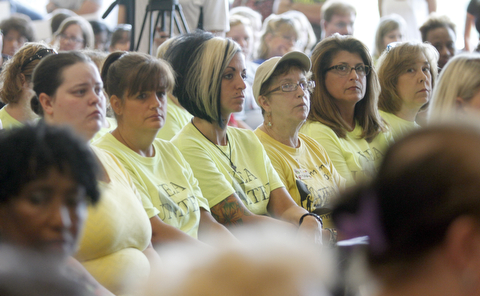        ROBERT K. YOSAY  | THE VINDICATOR..show of solidarity as a row of spectators from teachers of Youngstown Schools..State Sen. Joe Schiavoni  state Rep. Michele-Lepore-Hagan, Mayor John A. McNally will hosted a meeting  William Holmes McGuffey Elementary School to discuss the Youngstown plan legislated for city schools recovery.  ..