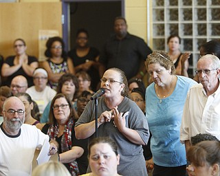        ROBERT K. YOSAY  | THE VINDICATOR..State Sen. Joe Schiavoni  state Rep. Michele-Lepore-Hagan, Mayor John A. McNally will hosted a meeting  William Holmes McGuffey Elementary School to discuss the Youngstown plan legislated for city schools recovery.  ..