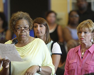        ROBERT K. YOSAY  | THE VINDICATOR..Board Member Jackie Adair .. talks about the issues of the schools  - behind her is Stacie  Erdos from United Way ..State Sen. Joe Schiavoni  state Rep. Michele-Lepore-Hagan, Mayor John A. McNally will hosted a meeting  William Holmes McGuffey Elementary School to discuss the Youngstown plan legislated for city schools recovery.  ..