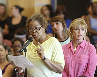        ROBERT K. YOSAY  | THE VINDICATOR..Board Member Jackie Adair .. talks about the issues of the schools  - behind her is Stacie  Erdos from United Way ..State Sen. Joe Schiavoni  state Rep. Michele-Lepore-Hagan, Mayor John A. McNally will hosted a meeting  William Holmes McGuffey Elementary School to discuss the Youngstown plan legislated for city schools recovery.  ..