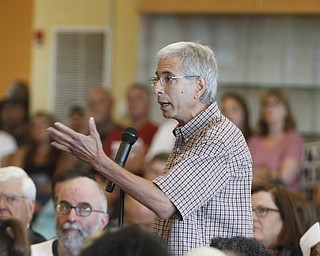        ROBERT K. YOSAY  | THE VINDICATOR..Bill Miller has questions as an educator for over 30 years of  Tom Humphries ..State Sen. Joe Schiavoni  state Rep. Michele-Lepore-Hagan, Mayor John A. McNally will hosted a meeting  William Holmes McGuffey Elementary School to discuss the Youngstown plan legislated for city schools recovery.  ..
