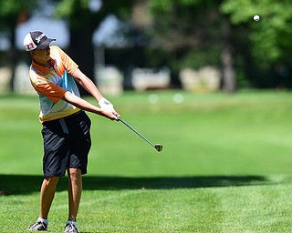 WARREN, OHIO - JULY 16, 2015: Brian Kordupel of Boardman chips onto the green on the 13th hole Thursday afternoon during a Vindy Greatest Golfer qualifying Tournament. DAVID DERMER | THE VINDICATOR