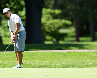 WARREN, OHIO - JULY 16, 2015: Brian Terlesky of Boardman follows through on his putt on the 12th hole Thursday afternoon during a Vindy Greatest Golfer qualifying Tournament. DAVID DERMER | THE VINDICATOR