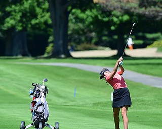 WARREN, OHIO - JULY 16, 2015: Kristin Shelley of Canfield follows through on her approach shot on the 1st hole Thursday afternoon during a Vindy Greatest Golfer qualifying Tournament. DAVID DERMER | THE VINDICATOR