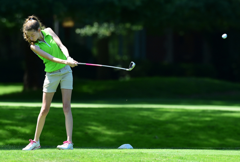 WARREN, OHIO - JULY 16, 2015: Madison Dailey of Mohawk tees off on the 3rd hole Thursday afternoon during a Vindy Greatest Golfer qualifying Tournament. DAVID DERMER | THE VINDICATOR