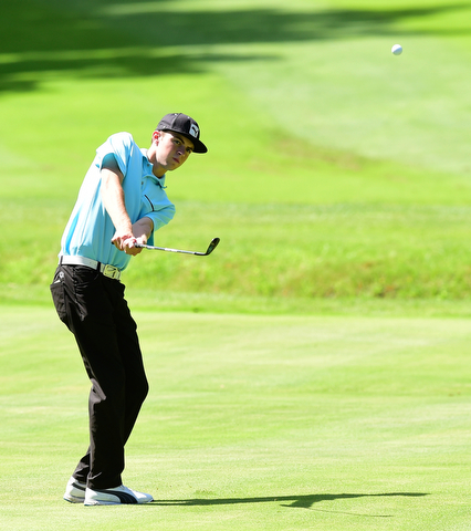 WARREN, OHIO - JULY 16, 2015: Bryan Oatridge follows through on the 14th hole Thursday afternoon during a Vindy Greatest Golfer qualifying Tournament. DAVID DERMER | THE VINDICATOR