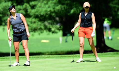 WARREN, OHIO - JULY 16, 2015: Tori Augustine of Boardman reacts after her putt stopped short of the 12th hole Thursday afternoon during a Vindy Greatest Golfer qualifying Tournament. DAVID DERMER | THE VINDICATOR .Sarah Brindley of Howland pictured.