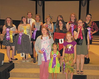SPECIAL TO THE VINDICATOR
Thirteen members of Western Reserve Rangers 4-H Club recently earned awards at the Mahoning County 4-H Style Revue, which took place July 13 at Old North Church in Canfield. In front from left are Camille Kirk; Samantha Morgan, model for Camille; and Evelyn Collier; in row two, Olivia Haid and Rachel McBride; row three, Emily Smith, Abby Schors, Taylor Smith, Bailey Hornberger, Isabel Schors, Brianna Herman and Shannon Marshburn; and in back, 2015 4-H King Levi Smith. Other club members who earned awards are Katie Prosser and Tiffany Voland.