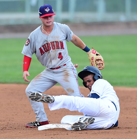 NILES, OHIO - JULY 17, 2015: Base runner Willi Castro #2 of the Scrappers collides with second basemen Dalton Dulin #4 of the Doubledays after stealing second base in the 1st inning during Friday nights game at Eastwood Field. DAVID DERMER | THE VINDICATOR