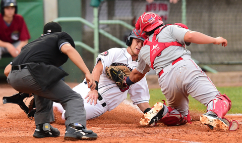 NILES, OHIO - JULY 17, 2015: Connor Marabell #8 of the Scrappers is tagged out by catcher Jorge Tillero #37 of the Doubledays in the 4th inning during Friday nights game at Eastwood Field. DAVID DERMER | THE VINDICATOR.Home plate umpire David Martinez pictured.