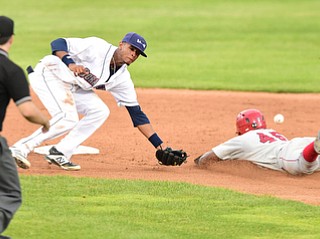 NILES, OHIO - JULY 17, 2015: Short stop Willi Castro #2 of the Scrappers is unable to play the throw from the catcher while Rafael Bautista #45 of the Doubledays steals second base in the 5th inning during Friday nights game at Eastwood Field. DAVID DERMER | THE VINDICATOR Umpire Donnie Smith pictured.