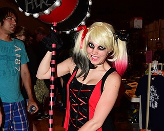 WARREN, OHIO - JULY 18, 2015: Heather Newsome of Niles poses for a picture while dressed as Harley Quinn Saturday afternoon at Packard Music Hall during All-Americon 6. DAVID DERMER | THE VINDICATOR..Harley Quinn is a character from Batman.