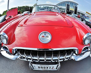Jeff Lange | The Vindicator  JULY 19, 2015 - Seeming to sport a big smile and a historical plate is this classic 1958 Corvette owned by Dave Murdoch of Canfield during Sunday's Mahoning Valley Corvettes Club car show held at Greenwood Chevrolet in Austintown.