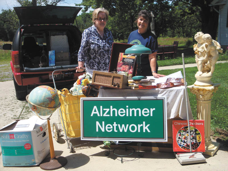 SPECIAL TO THE VINDICATOR
The Alzheimer Network will host a garage sale from 9 a.m. to 3 p.m. July 30 and 31 and from 9 a.m. to 11 a.m. Aug. 1 at Western Reserve United Methodist Church, 4580 Canfield Road, Canfield (Route 62 between Cornersburg and Canfield). The sale will benefit the local Alzheimer Network, a nonprofit organization with 11 family support groups in the area, and provide educational seminars for caregivers. For information call the network information line at 330-788-9755. From left are Mary Ann Frank, volunteer, and Sandra Pope, event co-chairman. Dorothy Barto also is a co-chairman.