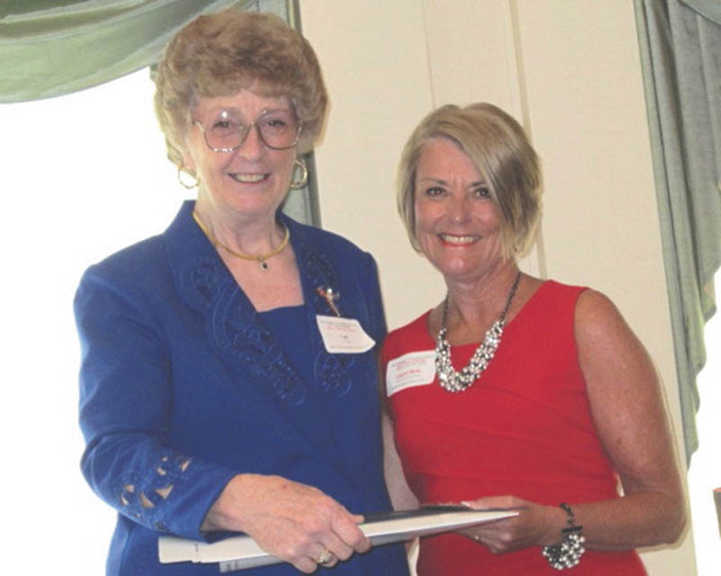 SPECIAL TO THE VINDICATOR
Lyn Bliss, left, president of the Ohio Federation of Republican Women, stands with Carol Ann Robb, a judge for Mahoning County Seventh District Court of Appeals, at a recent OFRW Tribute to Women at Worthington Hills Country Club in Columbus.