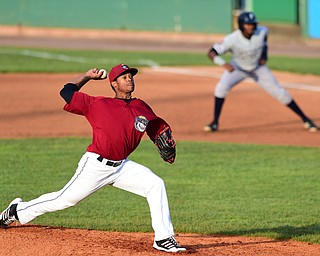 NILES, OHIO - JULY 22, 2015: Pitcher Jared Robinson #22 of the Scrappers throws a pitch in the 2nd inning of Wednesday nights game at Eastwood Field. DAVID DERMER | THE VINDICATOR