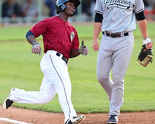 NILES, OHIO - JULY 22, 2015: Base runner Silento Sayles #9 of the Scrappers reaches first base after a single in the 3rd inning of Wednesday nights game at Eastwood Field. DAVID DERMER | THE VINDICATOR