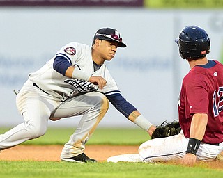 NILES, OHIO - JULY 22, 2015: Second basemen Thairo Estrada #66 of the Yankees tags out Daniel Salters #12 of the Scrappers, who was attempting to steal second base in the 7th inning of Wednesday nights game at Eastwood Field. DAVID DERMER | THE VINDICATOR