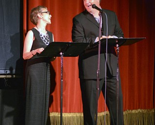 Katie Rickman | The Vindicator.Kathy Appugliese and John Cox perform "The Glass Menagerie" during the"Exit Stage Left" tribute to the late Bentley Lenhoff Saturday July 25, 2015 at the playhouse.