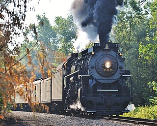 Jeff Lange | The Vindicator  JULY 25, 2015 - Nickel Plate Road No. 765, a 71 year old steam powered locomotive, makes it's way down the track, Saturday morning in Youngstown.