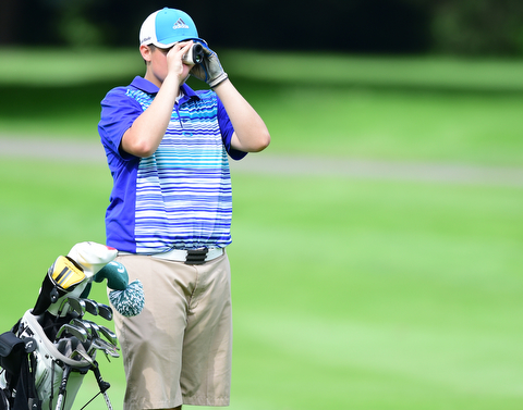 HUBBARD, OHIO - JUNE 26, 2015: Kevin Baker of McDonald uses his range finder on the 18th hole Friday afternoon at Pine Lakes during a Vindy Greatest Golfer qualifying Tournament. DAVID DERMER | THE VINDICATOR