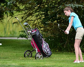 HUBBARD, OHIO - JUNE 26, 2015: Madison Dailey of Mohawk chips toward the green on the 11th hole Friday afternoon at Pine Lakes during a Vindy Greatest Golfer qualifying Tournament. DAVID DERMER | THE VINDICATOR