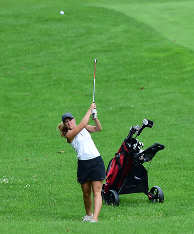 HUBBARD, OHIO - JUNE 26, 2015: Cheyenne Titus of McDonald follows through on her approach shot on the 13th hole Friday afternoon at Pine Lakes during a Vindy Greatest Golfer qualifying Tournament. DAVID DERMER | THE VINDICATOR