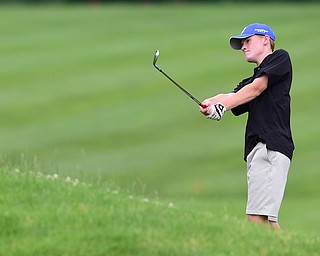 HUBBARD, OHIO - JUNE 26, 2015: Keegan Butler of Austintown chips onto the green on the 13th hole Friday afternoon at Pine Lakes during a Vindy Greatest Golfer qualifying Tournament. DAVID DERMER | THE VINDICATOR