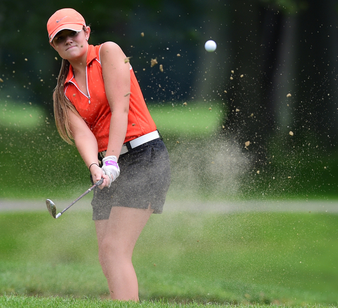 BOARDMAN, OHIO - JULY 1, 2015: Sarah Brindley of Howland chips out of the bunker on the 8th hole at Mill Creek Golf Course Wednesday afternoon during a Vindy Greatest Golfer qualifying Tournament. DAVID DERMER | THE VINDICATOR