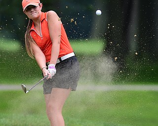 BOARDMAN, OHIO - JULY 1, 2015: Sarah Brindley of Howland chips out of the bunker on the 8th hole at Mill Creek Golf Course Wednesday afternoon during a Vindy Greatest Golfer qualifying Tournament. DAVID DERMER | THE VINDICATOR