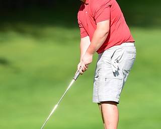 VIENNA, OHIO - MAY 17, 2015: Joey Shushok of Austintown watches as his putt breaks toward the hole on the 17th hole Sunday afternoon at Squaw Creek Country Club during the Vindy Greatest Golfer junior qualifier. (Photo by David Dermer/Youngstown Vindicator)