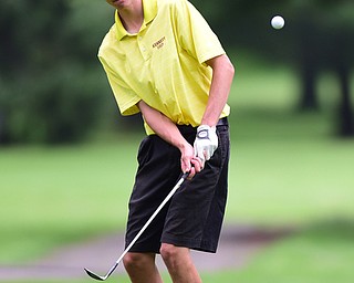 HERMITAGE, PENNSYLVANIA - JUNE 19, 2015: Jacob Wilson of Sharon chips onto the green from the short rough on the 6th hole Friday morning at Tam O' Shanter during the Vindy Greatest Golfer junior qualifier. DAVID DERMER | THE VINDICATOR