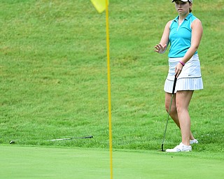 HERMITAGE, PENNSYLVANIA - JUNE 19, 2015: Nicolette Eddy of Niles encourages her golf ball to stop rolling after it went past the hole on the 17th hole Friday morning at Tam O' Shanter during the Vindy Greatest Golfer junior qualifier. DAVID DERMER | THE VINDICATOR