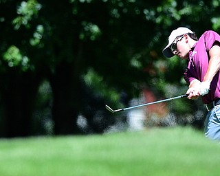 WARREN, OHIO - JULY 16, 2015: Brian Velasquez of Poland follows through on his approach shot on the 11th hole Thursday afternoon during a Vindy Greatest Golfer qualifying Tournament. DAVID DERMER | THE VINDICATOR